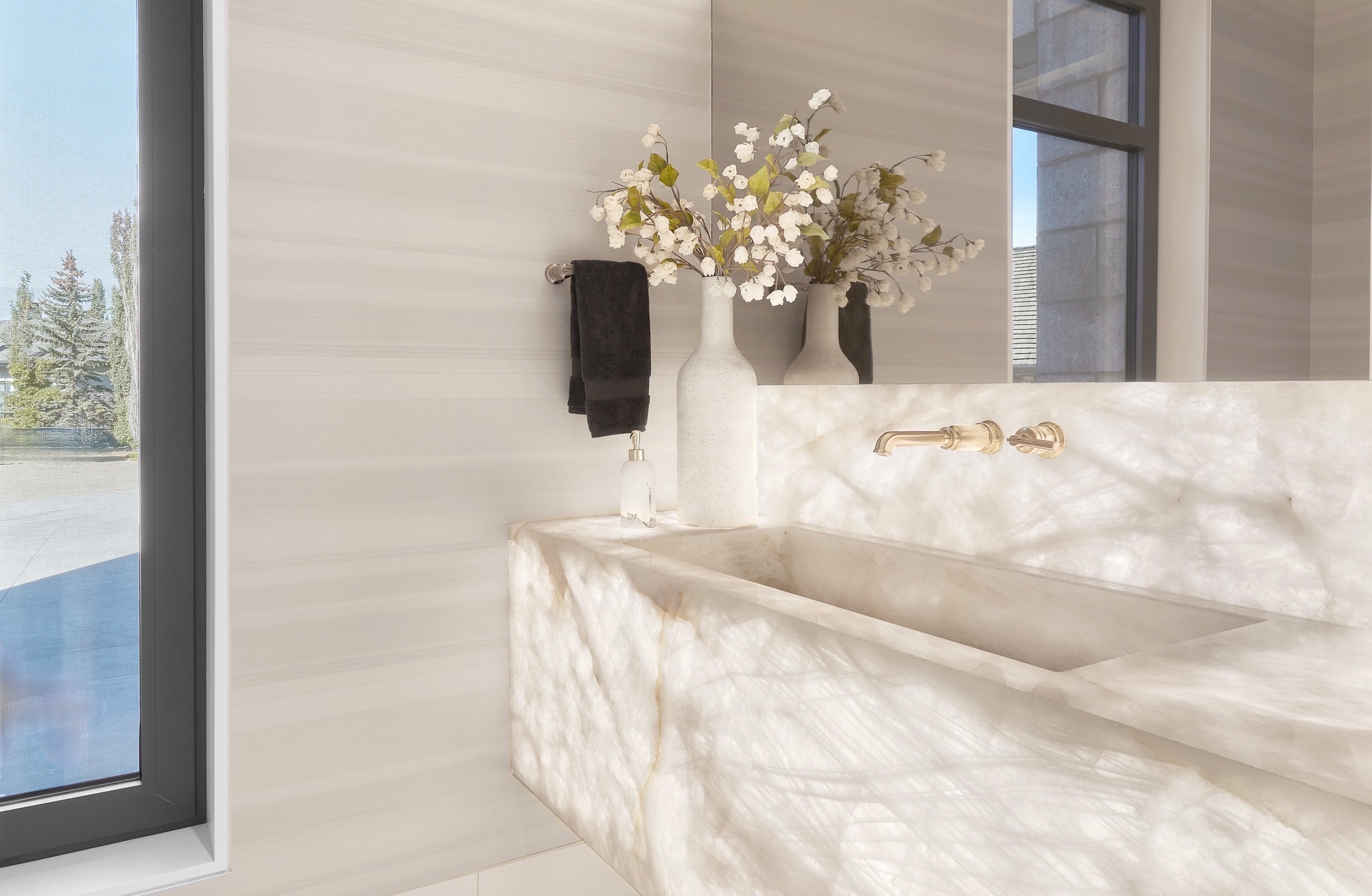 Powder room in 46 Kingsford Crescent home for sale in St. Albert by Holland & Associates Real Estate.